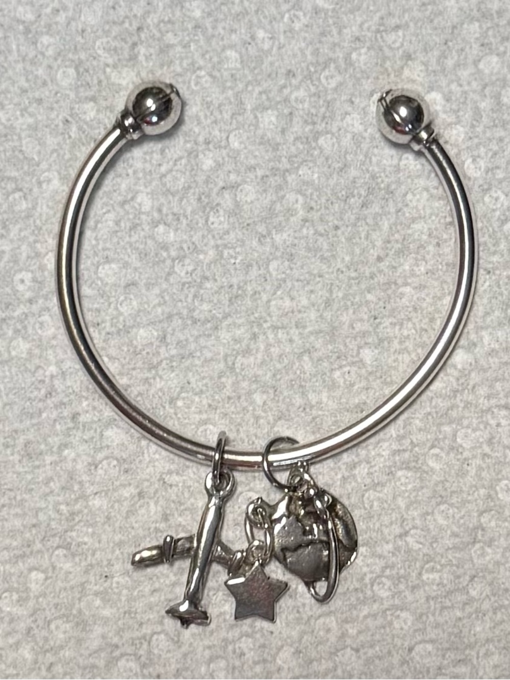 Sterling-Style Silver Charm Bangle Bracelet with Airplane, Star & Globe Charms